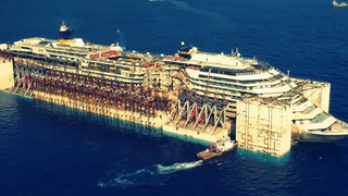 Drone films the eerie Costa Concordia sailing on its last voyage
